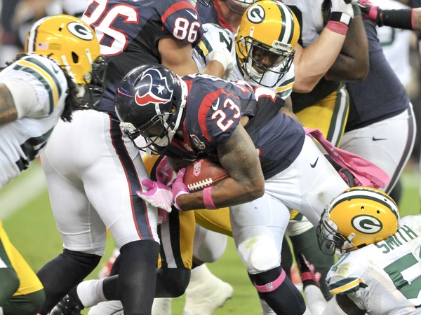 Arian Foster Packers swarmed