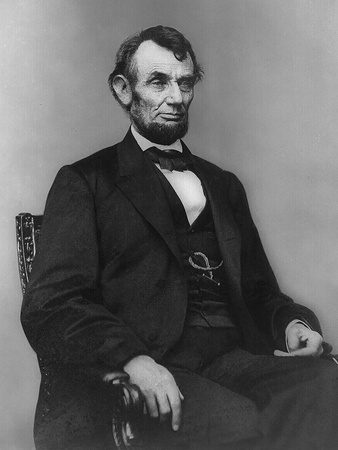 Abraham_Lincoln_seated,_Feb_9,_1864