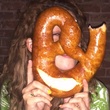Mongoose Versus Cobra, giant pretzel, friend