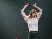 Taylor Swift arms up
