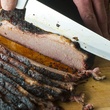 Sliced brisket at 3 Stacks Smoke & Tap House in Frisco