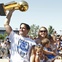 Mark Cuban raises the NBA championship trophy