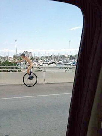 News_naked unicyclist_Kemah