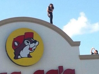 woman on Buc-ee's roof 2 June 2013