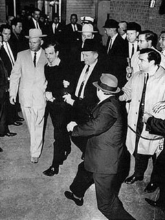 Lee Harvey Oswald being shot by Jack Ruby
