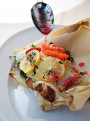 Daily fish roasted in parchment paper