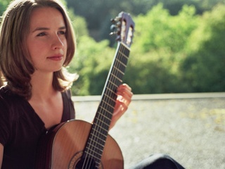 classical guitarist Janet Grohovac with guitar