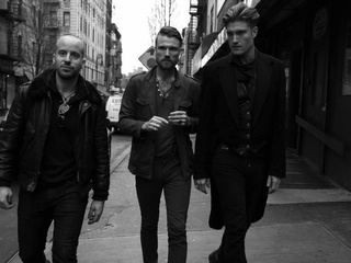 new york band The Kin walking down a street
