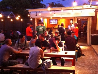 D&T Drive Inn ice house bar crowd patio at night