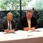 Bernard Cazeau and Joel Bartsch sign contract Houston Museum of Natural Science cave paintings at Lascaux