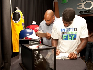 News_Bowling fundraiser_Andre Johnson_Travis Johnson