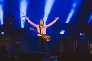 Paul McCartney at the Frank Erwin Center arms open
