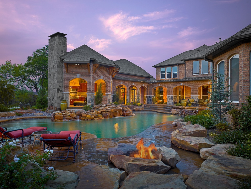 Pool Design Dallas image of a stone slow flowing waterfall in a pool in dallas Key Residential Pool Design In Dallas Pool Design Dallas 5 pool water conservation tips for dallas area pool owners Key Residential Pool Design In Dallas