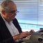 Andrew  Sarris, typing
