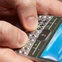 News_texting_closeup_cell phone