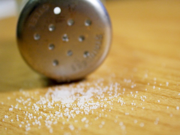 salt, spilled salt, salt shaker