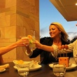 Americas River Oaks, patio dining, women toasting.jpg