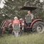 Helen and Dewan Hinsley near a tractor