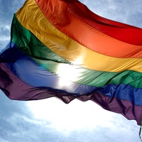 News_Rainbow flag_gay pride_sky_clouds
