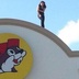 woman on Buc-ee's roof 2 June 2013