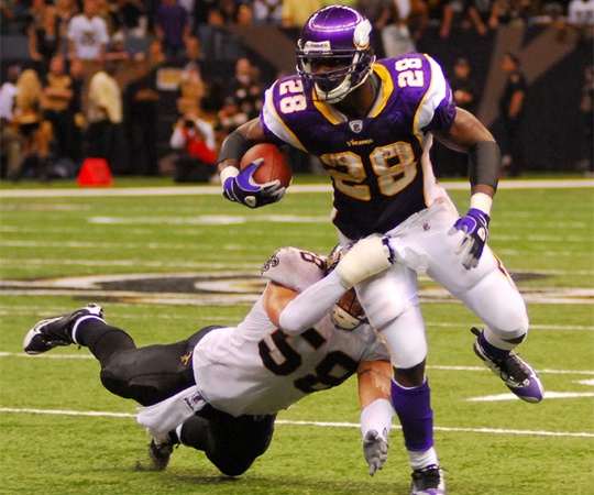 Adrian Peterson running