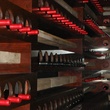 Davon, Reverse Happy Hour, August 2012, The wall of wine bottles at 1252