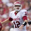 Austin Photo Set: News_Kevin Benz_thrashed but not trashed_UT football_OU_October 2011_Landry Jones