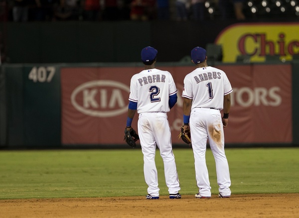 Jurickson Profar standing with Elvis Andrus