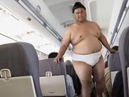 sumo wrestler, airplane, plane cabin