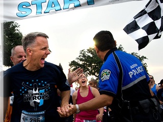 runners and police at Run with the Heroes 5k fundraiser