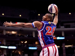 Harlem Globetrotter going for a dunk