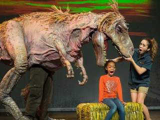 Erth's Dinosaur Zoo theropod with girl