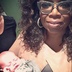 Oprah WInfrey with Caswell baby at Reef