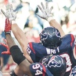 J.J. Watt hands higher pile 