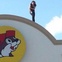woman on Buc-ee's roof 2 June 2013