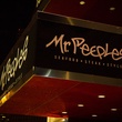 Mr. Peeples Houston restaurant exterior sign at night