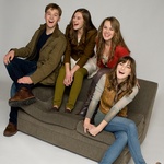 Von Trapp family on the couch