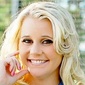 News_Jayme Lamm_head shot_column mug_with mic